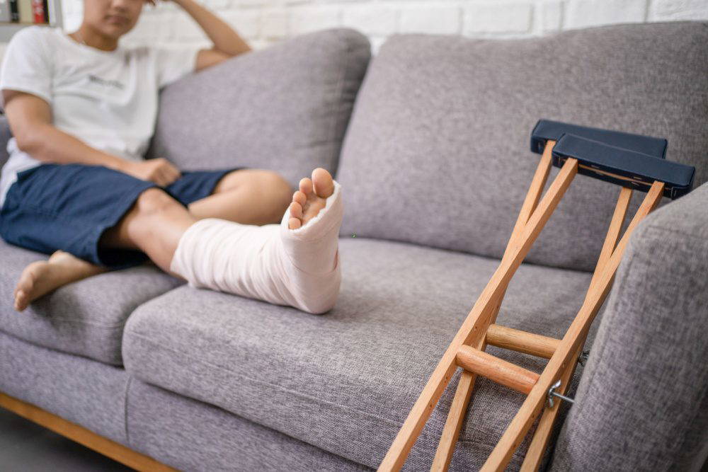 A person with a cast on their leg.